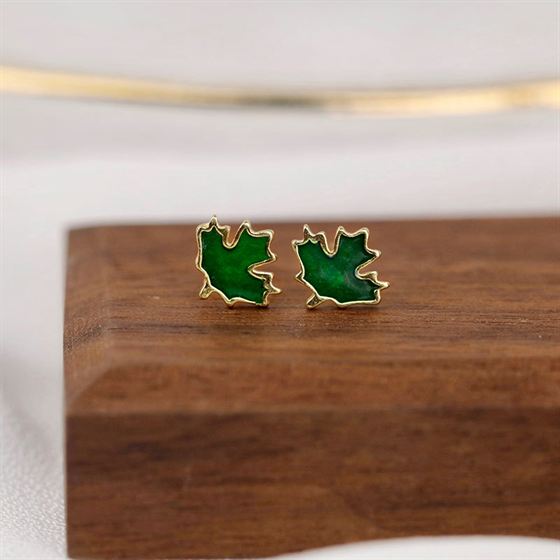 Detailed view of maple leaves .925 sterling silver stud earrings showing detailed leaf design and polished finish