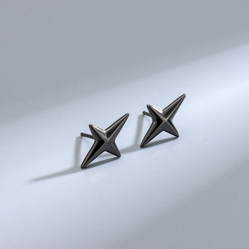 Detailed view of 15.8mm by 10.5mm quadrangle star .925 sterling silver screw stud earrings showing geometric star design and polished finish
