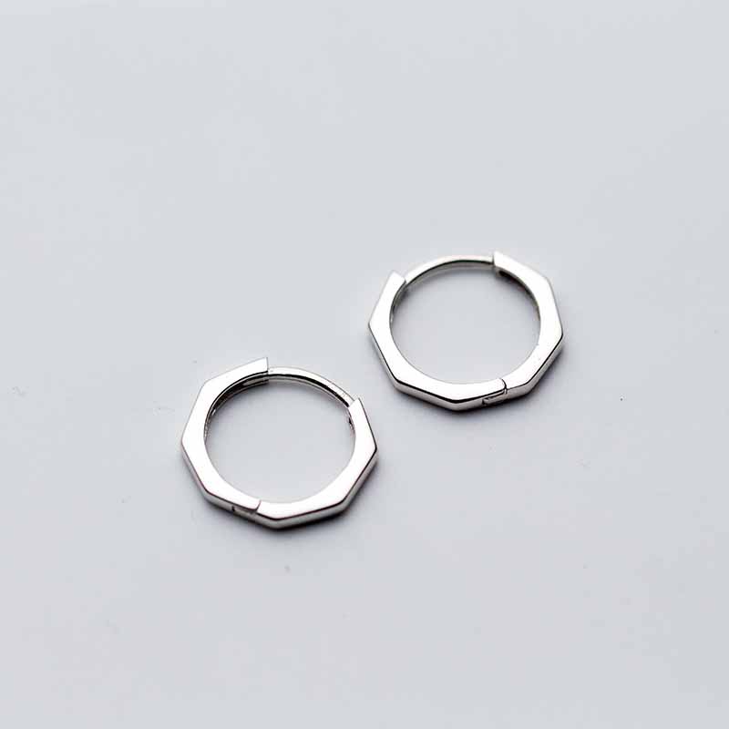 Detailed view of 13mm octagon .925 sterling silver hoop earrings showing geometric shape and polished finish