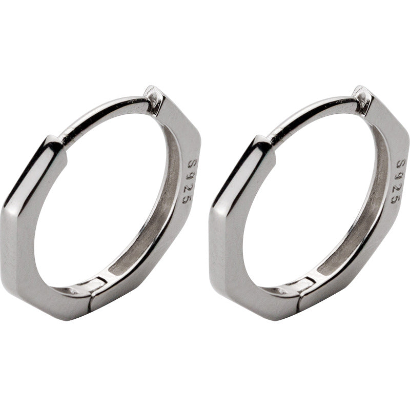 Detailed view of 13mm octagon .925 sterling silver hoop earrings showing geometric shape and polished finish