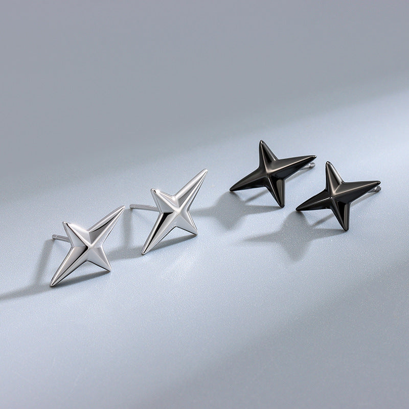 Detailed view of 15.8mm by 10.5mm quadrangle star .925 sterling silver screw stud earrings showing geometric star design and polished finish
