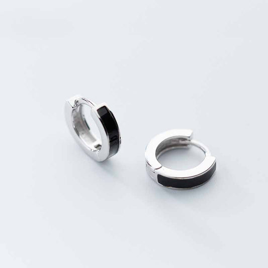 Detailed view of 2mm and 3mm circle .925 sterling silver hoop earrings showing sleek design and polished finish