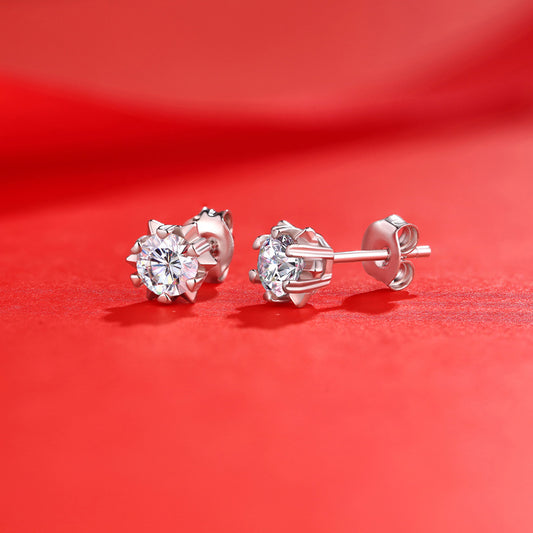 Detailed view of 8mm moissanite snowflake .925 sterling silver stud earrings showing intricate design and brilliant sparkle