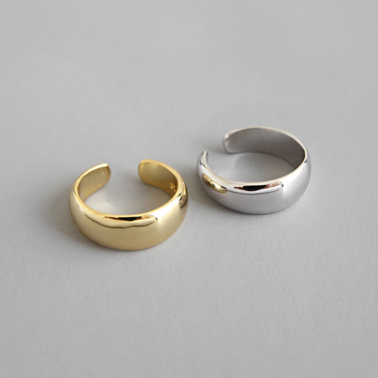 Detailed view of 5mm by 11.5mm non-pierced .925 sterling silver earring showing sleek cuff design and polished finish