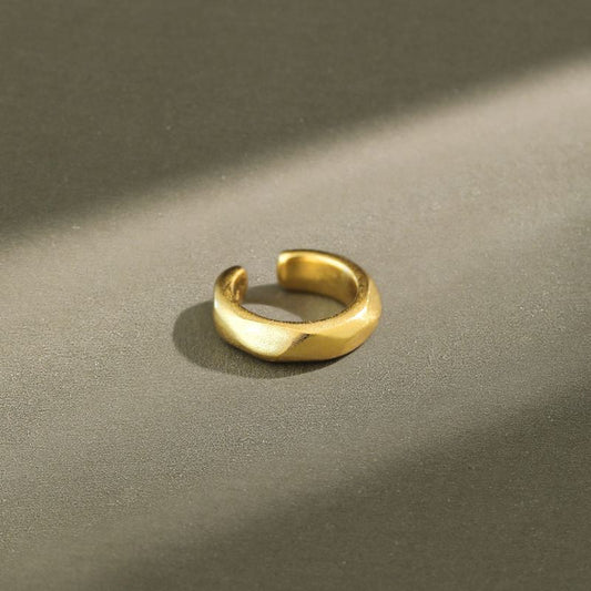 Detailed view of 10.5mm circle sterling silver non-pierced earring showing polished finish