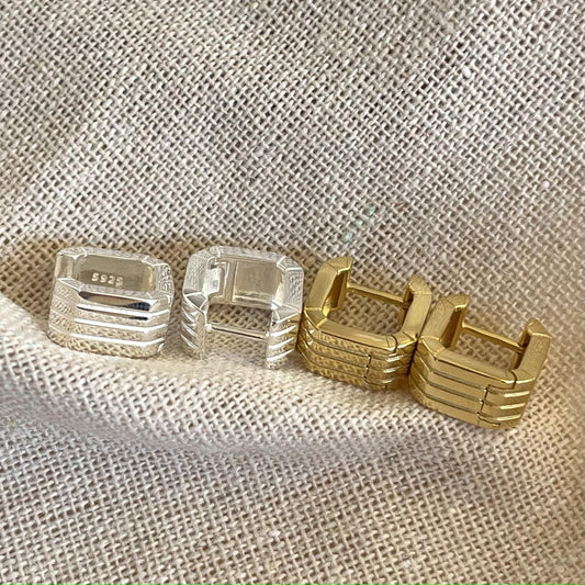 Detailed view of hollow square .925 sterling silver hoop earrings showing lightweight design and polished finish