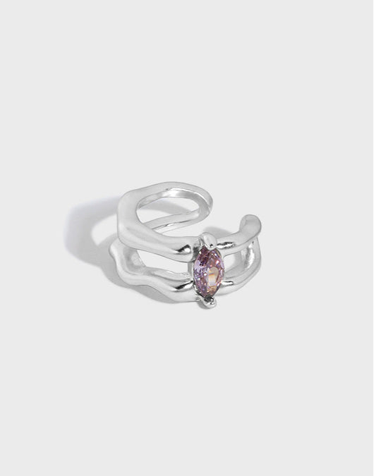 Detailed view of 7.3mm by 10.3mm oval double layer sterling silver non-pierced earring showing polished finish
