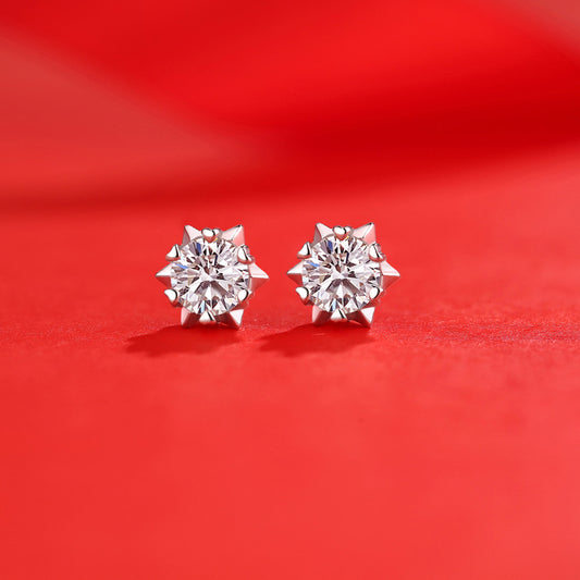 Detailed view of 8mm moissanite snowflake .925 sterling silver stud earrings showing intricate design and brilliant sparkle