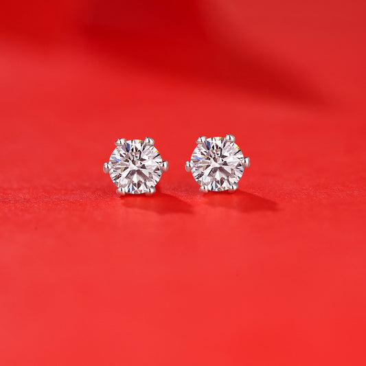 Detailed view of 7.5mm six claw moissanite .925 sterling silver stud earrings showing brilliant cut and polished finish
