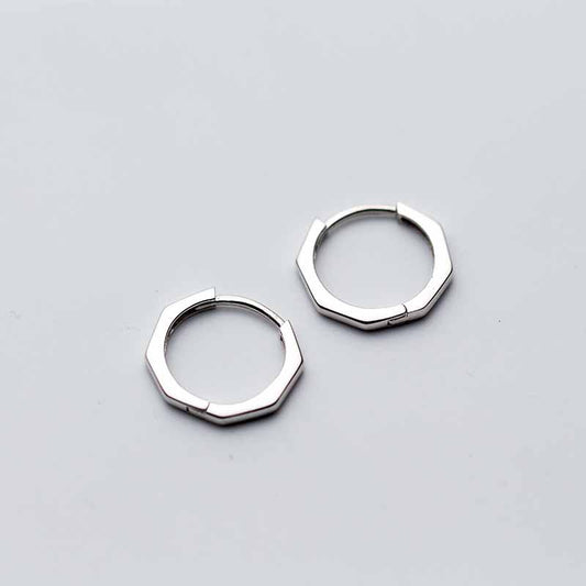Detailed view of 13mm octagon .925 sterling silver hoop earrings showing geometric shape and polished finish